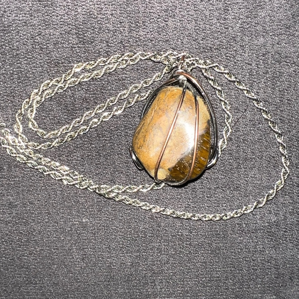 Tigers Eye Pendant with sterling silver chain and wrap around stone.